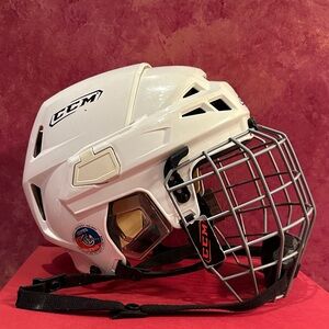 CCM White Hockey Helmet with Silver Face Cage, used.